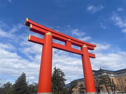 a giant red statue in front of a building at HOTEL AMANEK Kyoto Kawaramachi Gojo in Kyoto
