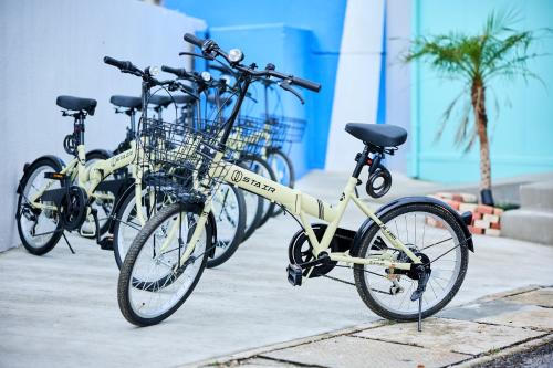 a group of bikes parked next to each other at Hotel CABANA カバナ 宮古島 in Miyako Island