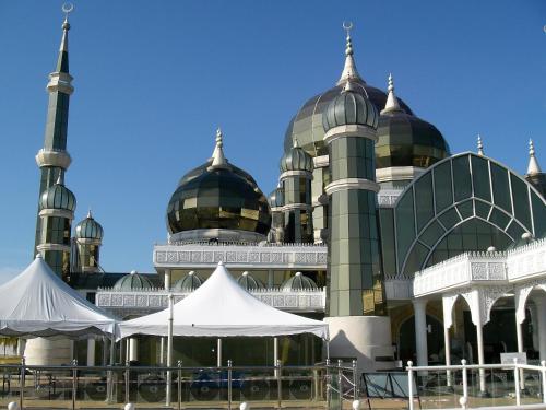 a large mosque with domes and tents in front of it at Rayyaz Inn in Kuala Terengganu