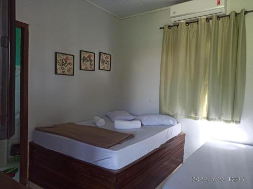 Hotel fazenda boa sorte tesisinde bir odada yatak veya yataklar