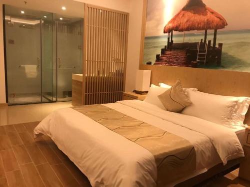 Cama o camas de una habitación en 海龙宫度假酒店