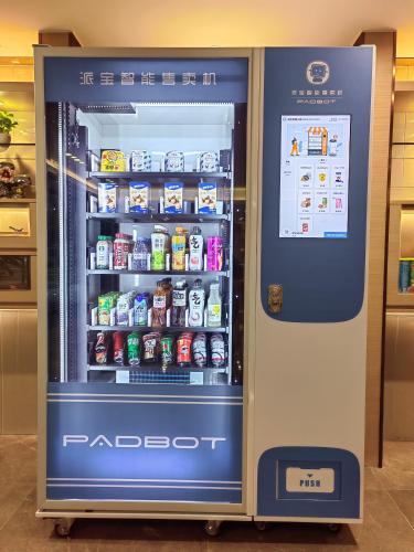 a vending machine with food and drinks in it at Guangzhou Baiyun Airport Yunzhi Hotel near Terminal One - Complimentary Shuttle Bus between hotel to Canton Fair Complex during Canton Fair in Guangzhou