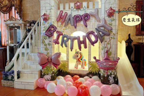 a display of a party with balloons and a staircase at Xin Yuan My Dream Castle in Dongshan
