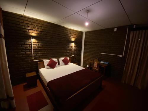 Ein Bett oder Betten in einem Zimmer der Unterkunft Diduli Hotel