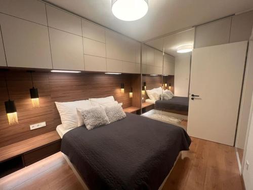 Llit o llits en una habitació de Karzo Property LK 208