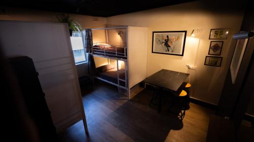 an overhead view of a room with a table in a room at Brisbane Quarters in Brisbane