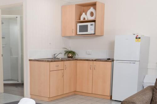 Kuchyň nebo kuchyňský kout v ubytování Best Western Tuscany on Tor Motor Inn