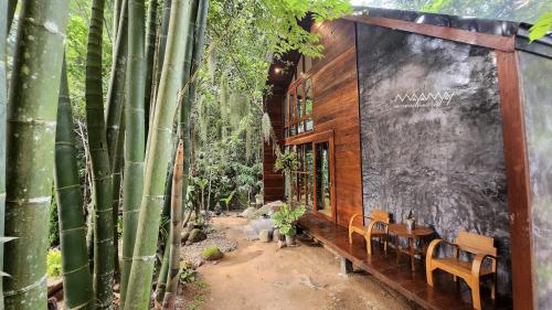 a restaurant in the middle of a bamboo forest at MayamYay Privacy Homestay @Mea Nea Chiang Dao in Chiang Dao