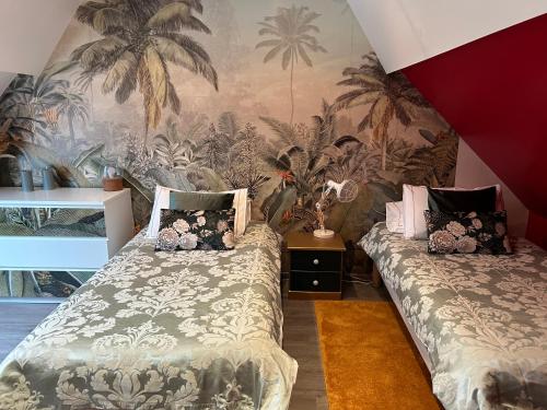 Letto o letti in una camera di Le relais du bord de seine