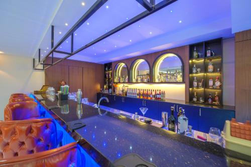 Ο χώρος του lounge ή του μπαρ στο Elysium Deluxe Suites Antalya