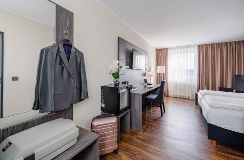 Katil atau katil-katil dalam bilik di Best Western PLAZA Hotel Grevenbroich