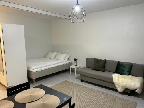 Ένα ή περισσότερα κρεβάτια σε δωμάτιο στο Haven Homes, Winter Haven