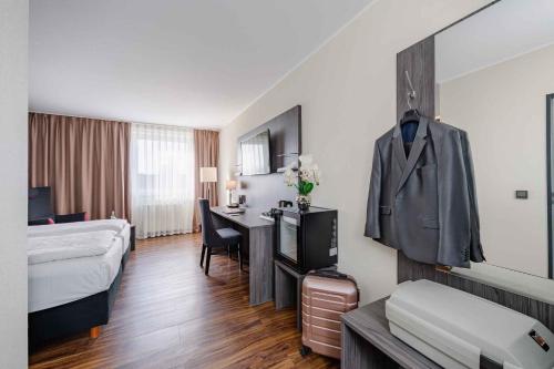 Katil atau katil-katil dalam bilik di Best Western PLAZA Hotel Grevenbroich