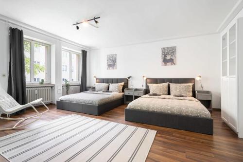 Living in Munich City Center tesisinde bir odada yatak veya yataklar