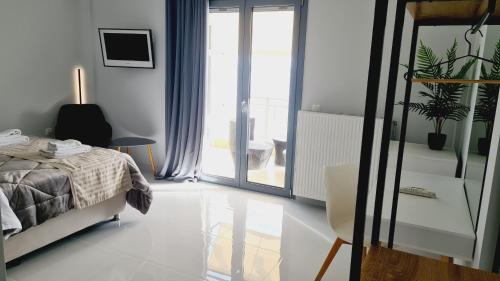 Postel nebo postele na pokoji v ubytování Villa Serafeim