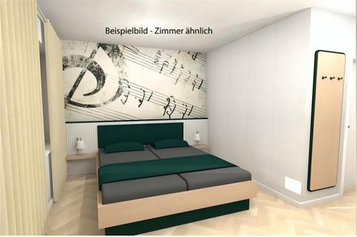 1 dormitorio con 1 cama con música en la pared en Hotel Klippenklang en Helgoland