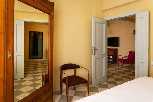 En eller flere senge i et værelse på Ayvalık merkezde bahçe kullanımlı daire