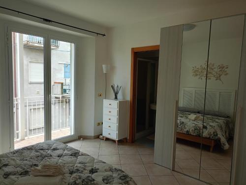 Letto o letti in una camera di Da Eolo - Appartamento al mare