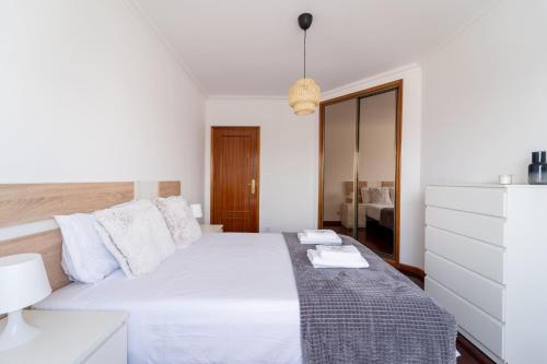 Beach Flat by House and People
