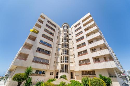 Beach Flat by House and People