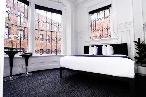 Katil atau katil-katil dalam bilik di Luxurious Studio in the Heart of Boston
