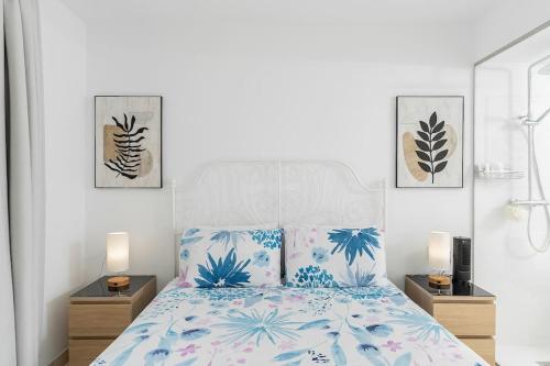 En eller flere senge i et værelse på Deluxe 2 bed Apartment