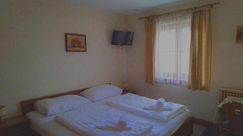 Кровать или кровати в номере Haus Wieshammer