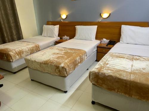 Postel nebo postele na pokoji v ubytování Index Hotel