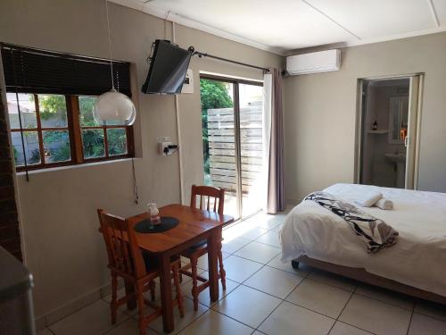 Ένα ή περισσότερα κρεβάτια σε δωμάτιο στο UNIQUE BnB
