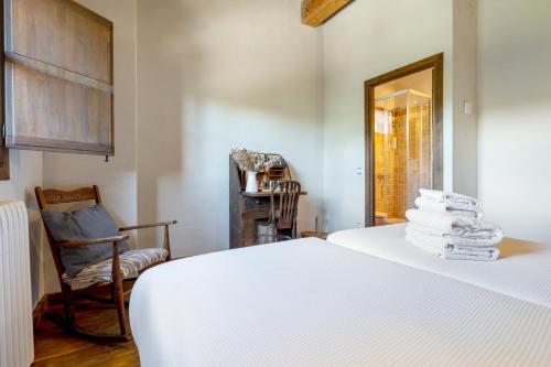 Postel nebo postele na pokoji v ubytování Casa Entera Mas De L'arlequi