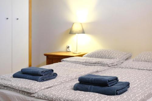 En eller flere senge i et værelse på Casa Magda and Luke