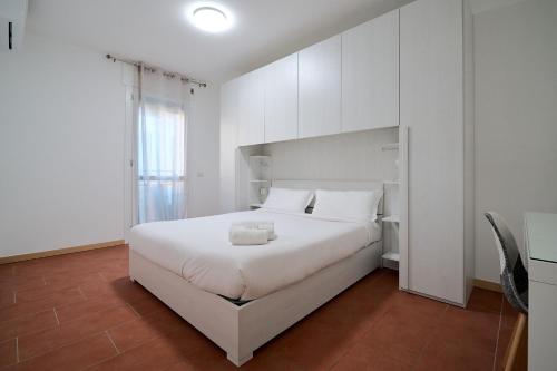 Ένα ή περισσότερα κρεβάτια σε δωμάτιο στο Xenia Apartments - Spacious and bright new flat with garden