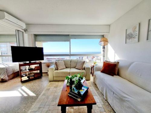 Posezení v ubytování Península de Punta, apartamento aconchegante com bela vista mar