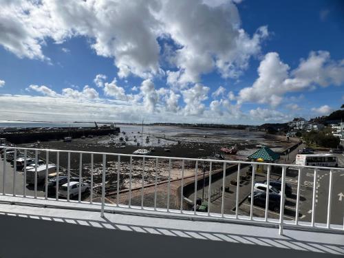 a view of a beach with cars parked on the sand at Seascale Hotel & Restaurant in Gorey