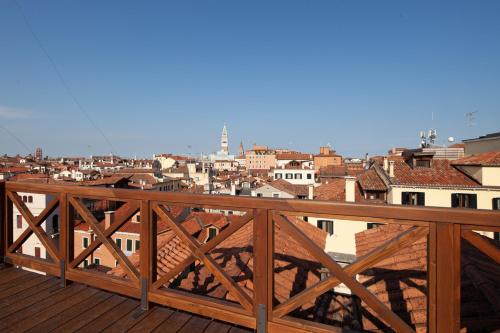 a view of a city from a balcony at Palazzo Pianca in Venice