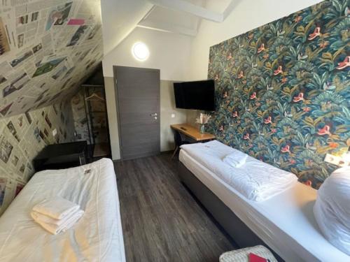 Postel nebo postele na pokoji v ubytování aappartel APARTHOTEL Herford