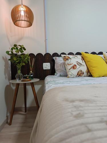 A bed or beds in a room at Hospedagem do Mathe