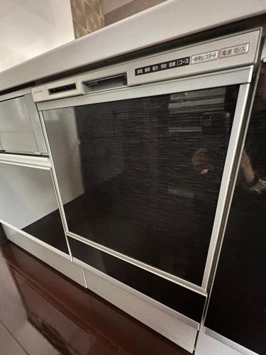 Kuchyň nebo kuchyňský kout v ubytování Penthouse Nakazato