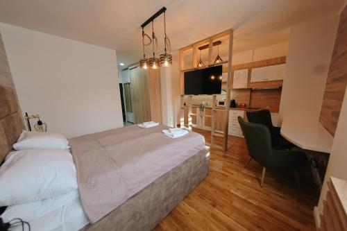 Postel nebo postele na pokoji v ubytování A-apartmani