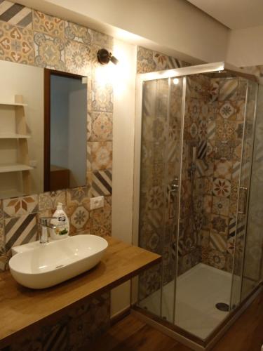 Ett badrum på Kite House Falconara