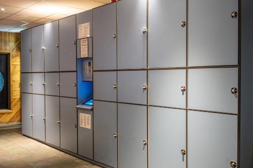 a row of lockers in a locker room at St Christopher's Inn Shepherd's Bush in London