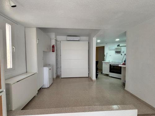 Køkken eller tekøkken på ESTUDIO DOS PLAYAS LA MANGA