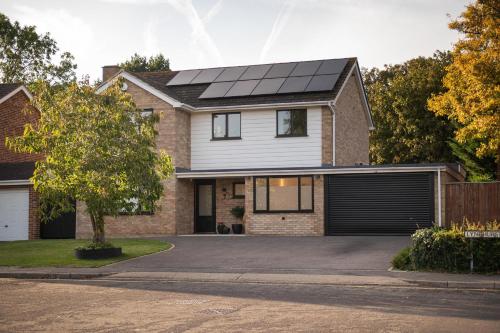 a house with solar panels on the roof at Lyndhurst House in Canterbury