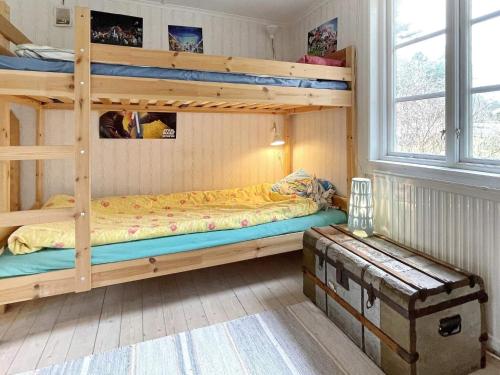 Ένα ή περισσότερα κρεβάτια σε δωμάτιο στο 4 star holiday home in JÖRLANDA-By Traum