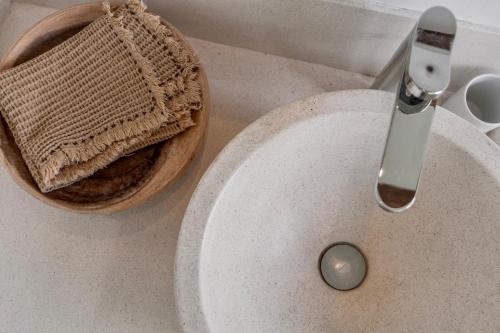 a knife sitting on a counter next to a sink at Villa Alba, Berawa Beach in Canggu