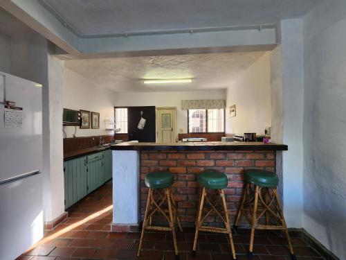 Kuchyň nebo kuchyňský kout v ubytování Peter Pan Place