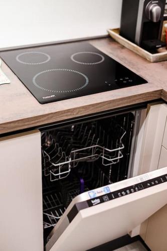 a stove top oven sitting in a kitchen at Casa Quattordici in Cesena