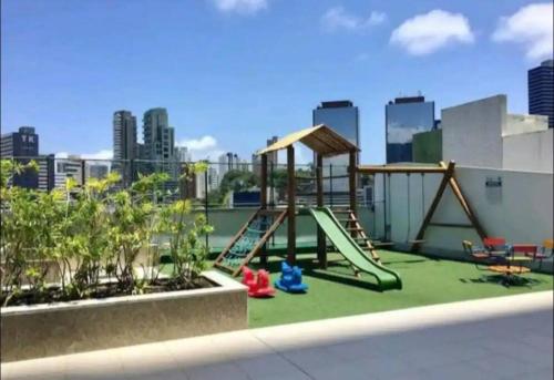 a playground on the roof of a building at Salvador Prime Premium 2 suítes in Salvador