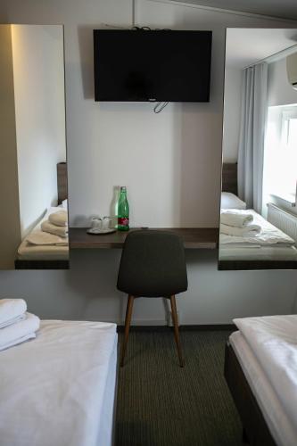 Postel nebo postele na pokoji v ubytování Golden Golem hotel & Spa
