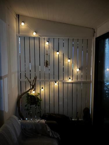a room with a wall with lights on it at Ocean Village in Amanzimtoti